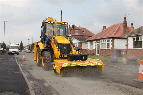 jcb skid steer driveway work|jcb pothole repair.